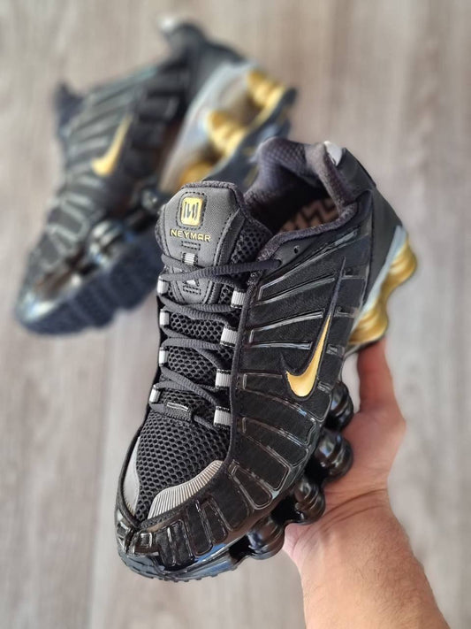 NIKE SHOX NEGRO/DORADO